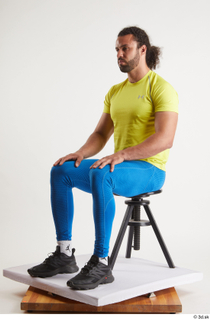 Simeon  1 black sneakers blue leggings dressed sitting sports…
